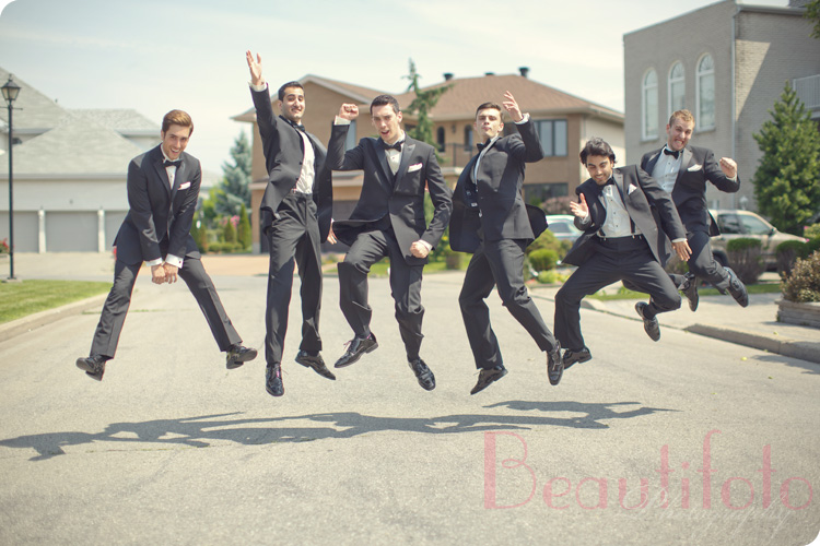 the groom and the ushers jumping